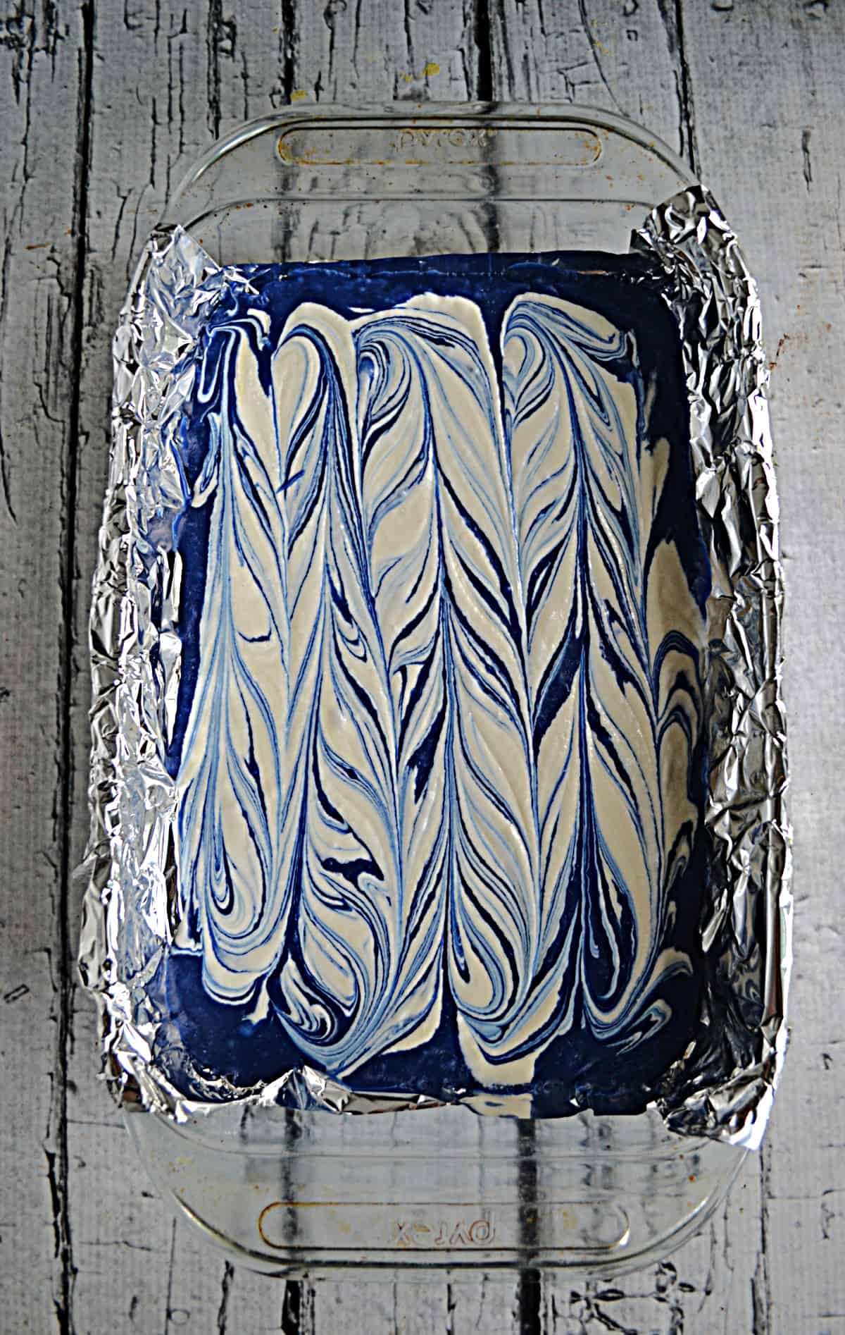 A pan of white and blue fudge swirled together.