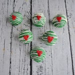 A cluster of Grinch Hot cocoa Bombs.