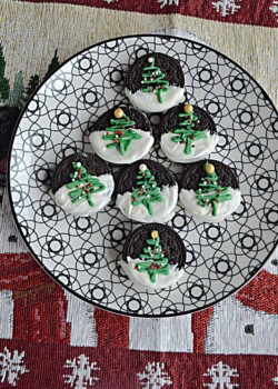 A plate of Holiday Oreos stacked into a tree shape.