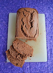 A close up of Nutella Bread with three slices cut off.