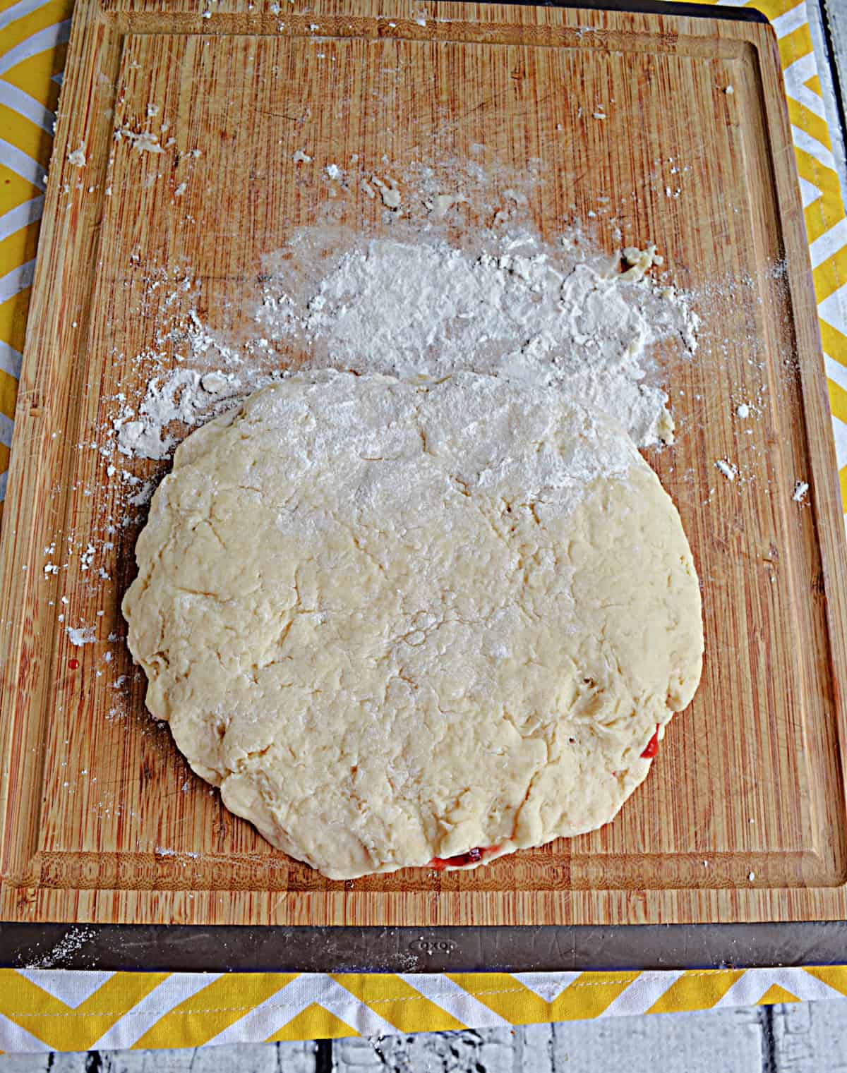 A thick scone dough filled with jame.