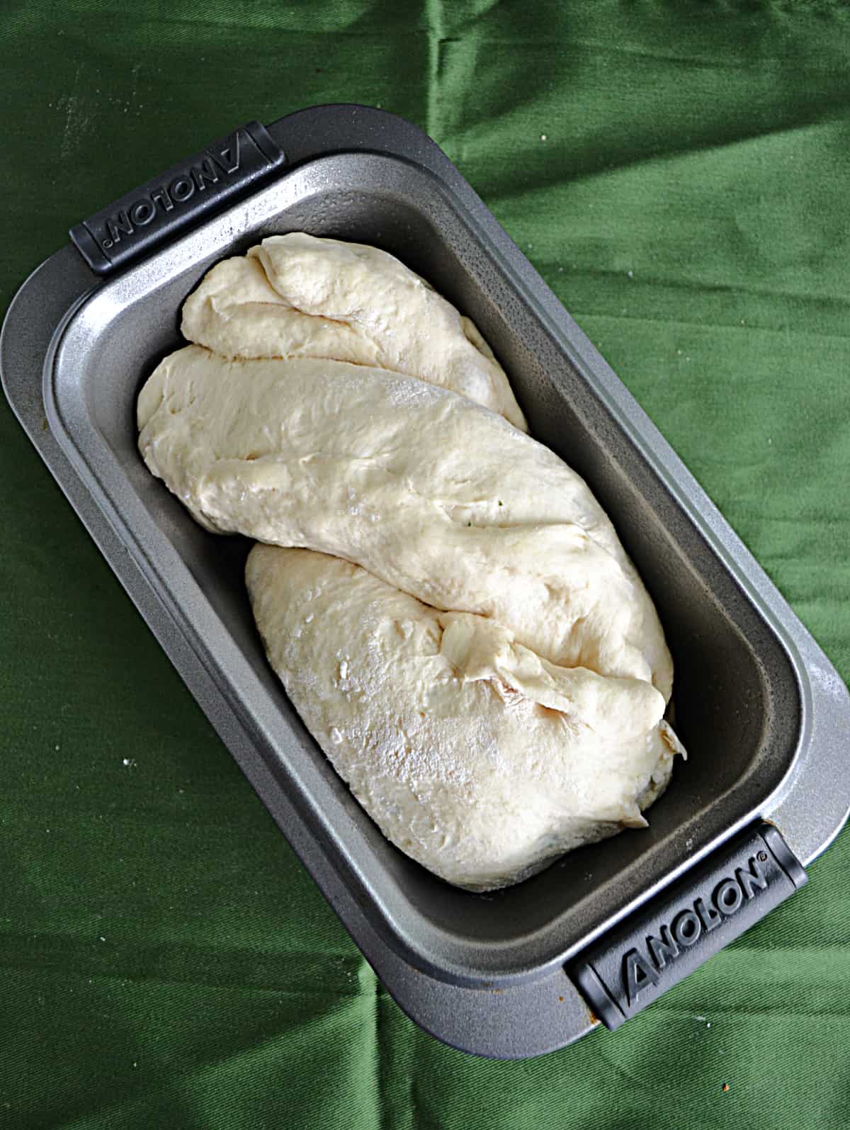 Bread dough twist in a pan.