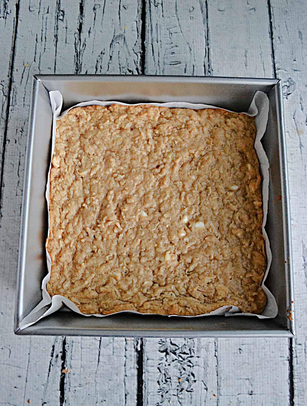 A pan of coconut white chocolate cookie bars.