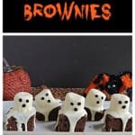Pin Image: Text title, A platter with ghost brownies on it and a pumpkin and spider behind the platter.