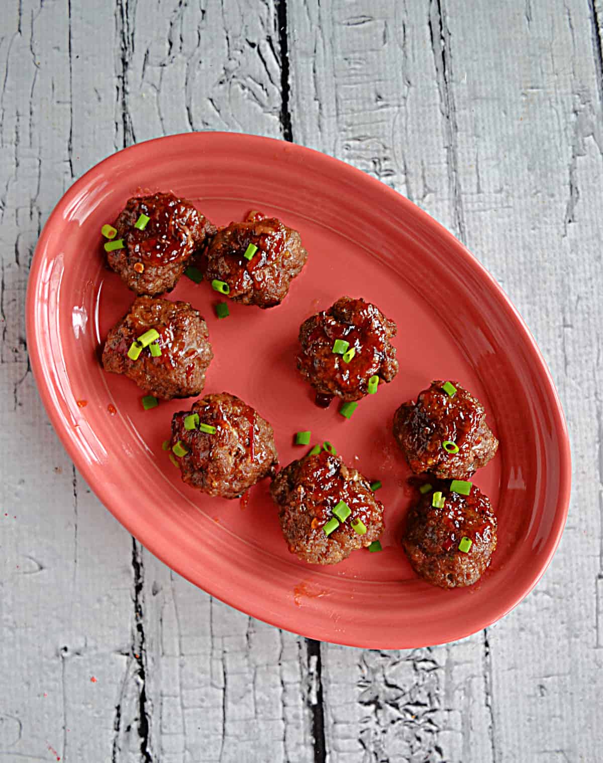 A plate of sweet and spicy Thai meatballs.
