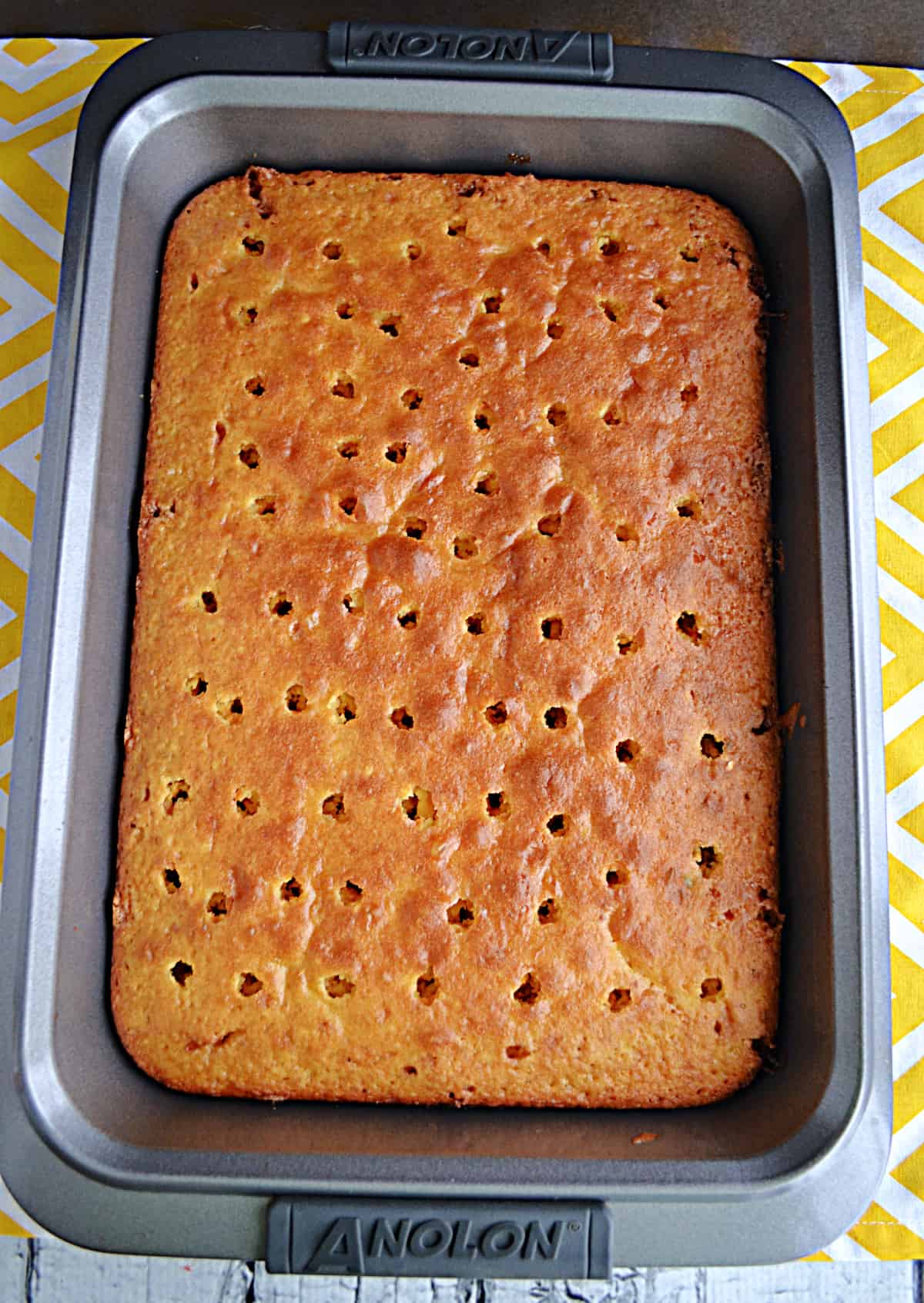 A cake with holes poked in it.
