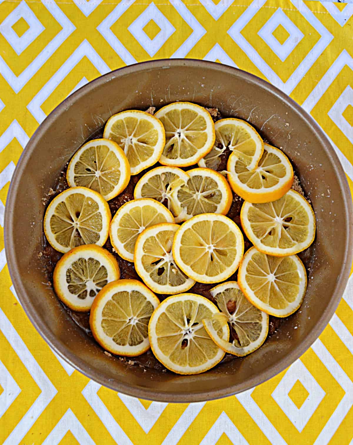 A pan with lemon in the bottom.