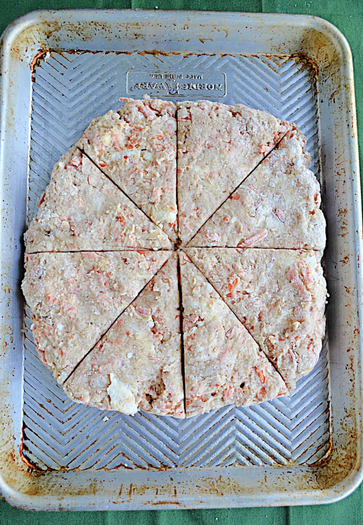 Scone dough cut into 8 pieces.