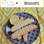 Pin Image: Title, a plate of stacked biscotti.