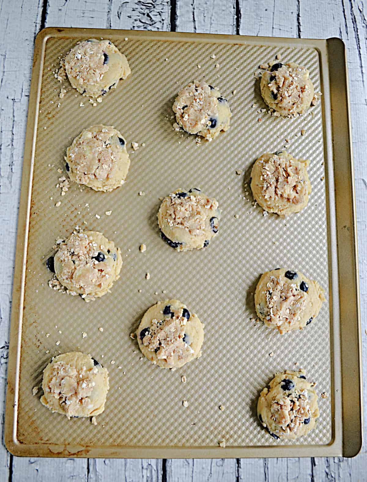 Blueberry muffins on a baking sheet