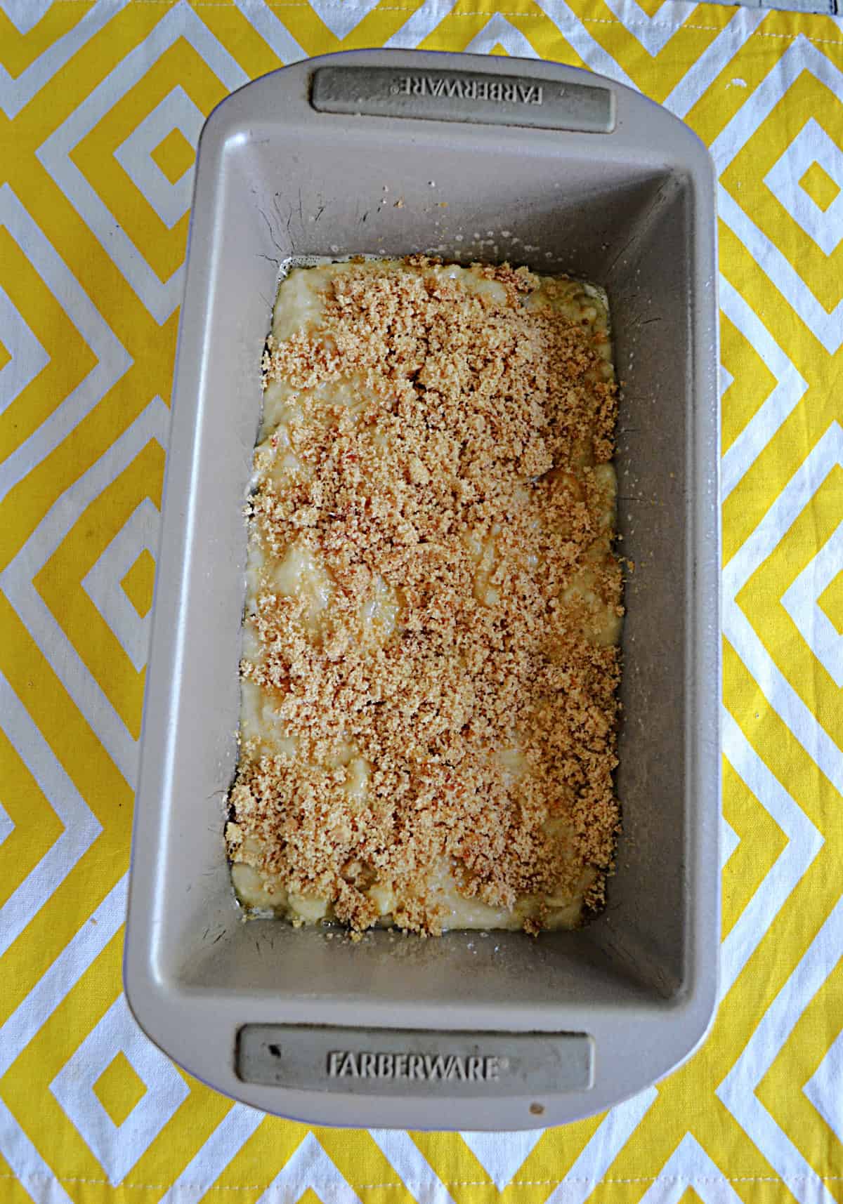 A pan with banana bread batter in it.