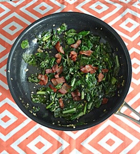 A pan of kale and bacon.