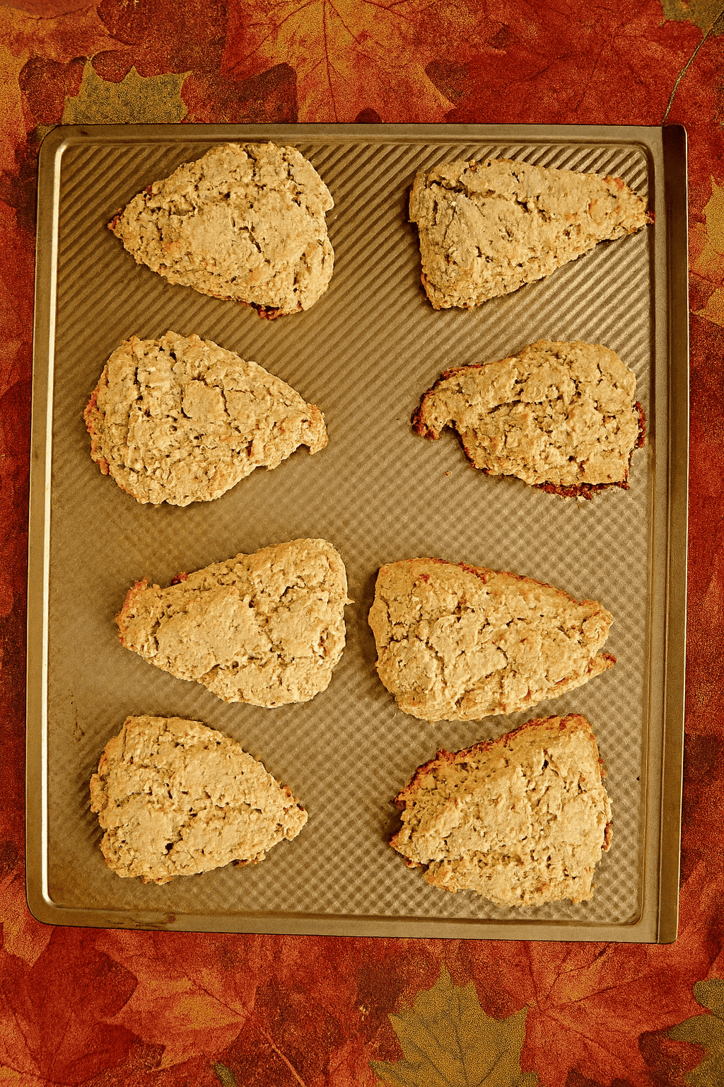 A baking pan with scones on it.