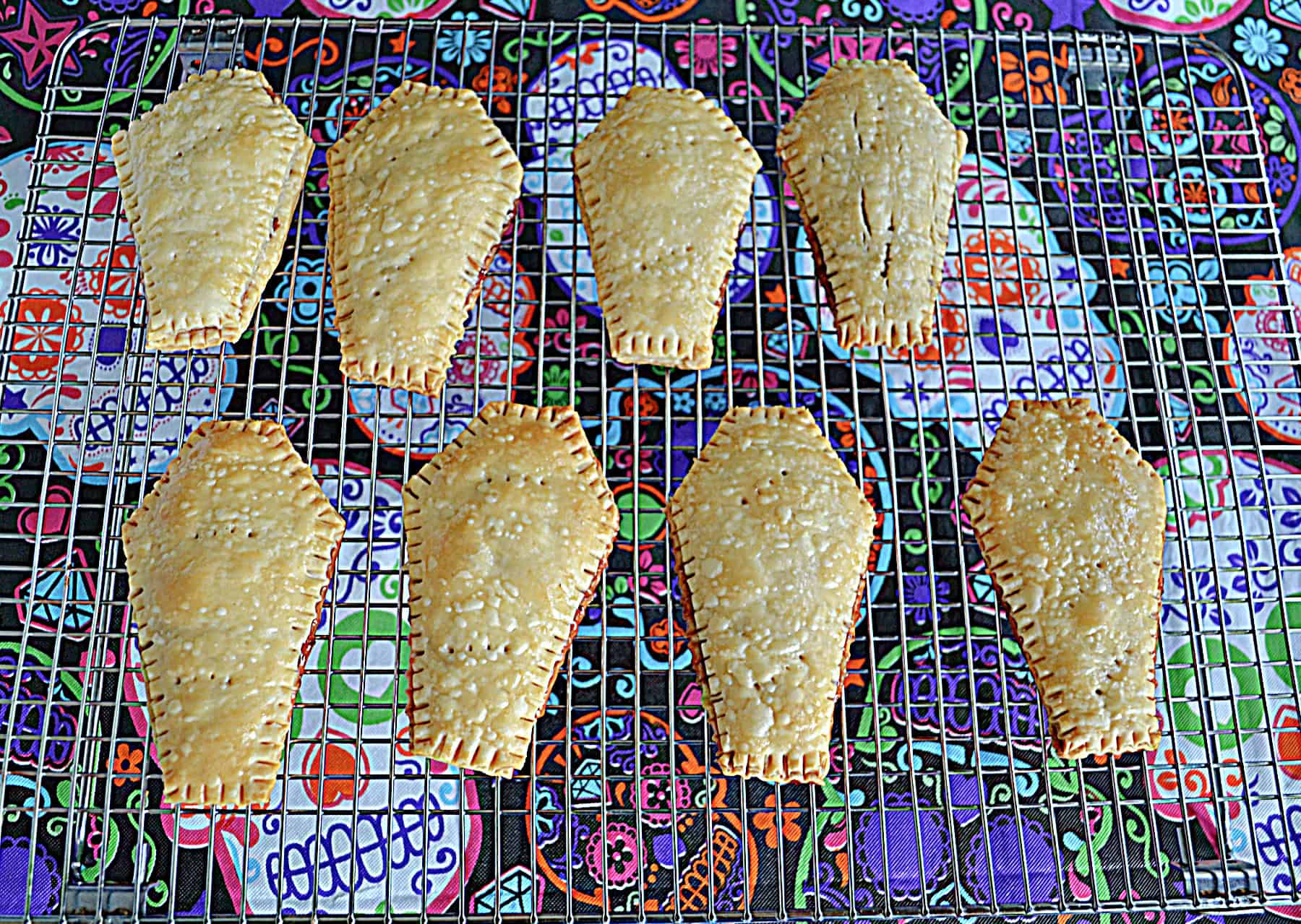 Golden brown coffin shaped pop tarts.