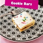 Pin Image: Title, a plate with a bar cookie with white icing and sprinkles on it.