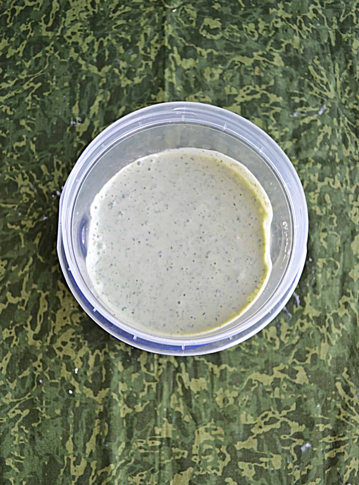 A bowl of buttermilk ranch dressing.