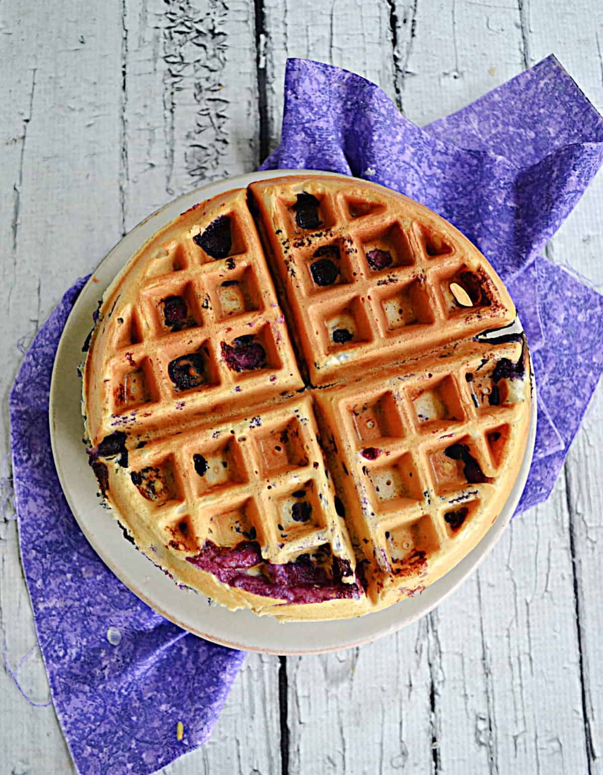 A waffle on a plate.