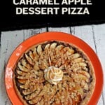 Pin Image: Title, A plate with a dessert pizza with thinly sliced apples, a crumble, whipped cream, and a caramel drizzle.