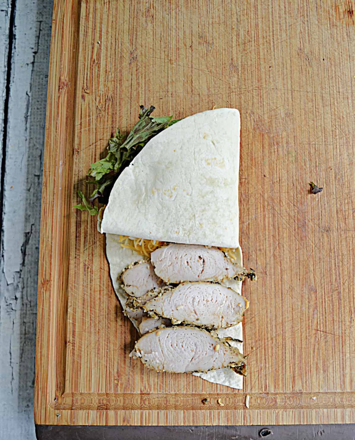 A wrap with the bottom and sides folded in.